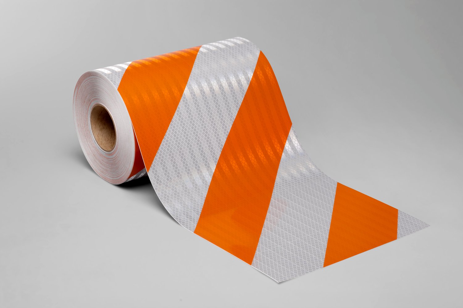 7010535187 - 3M Flexible Prismatic Reflective Barricade Sheeting 3336L Orange/White, 6 in stripe/left, 7 in x 100 yd