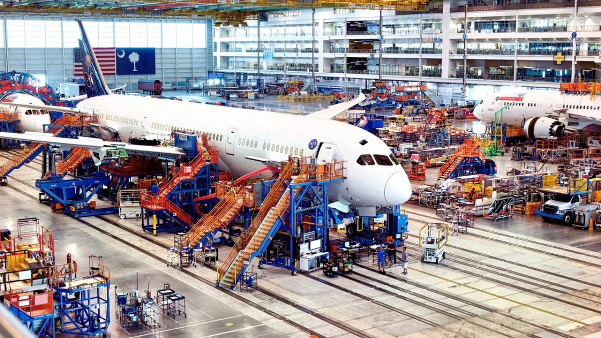 Aircraft assembly line showcasing aerospace manufacturing