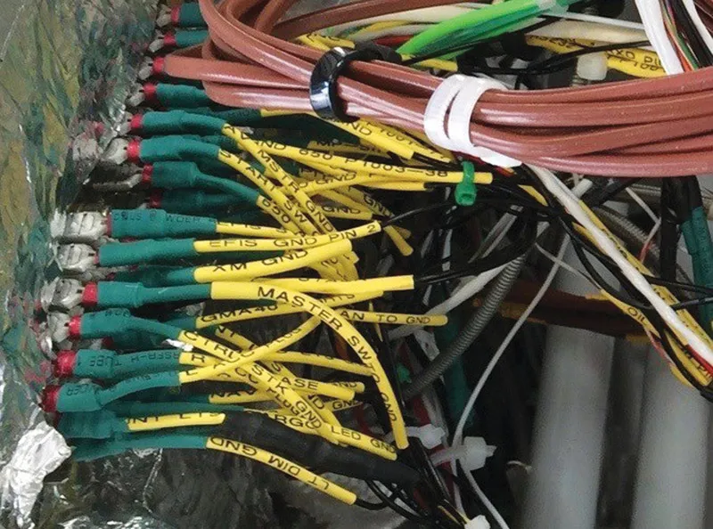 Labeled aircraft wiring harness with color-coded shielded conductors
