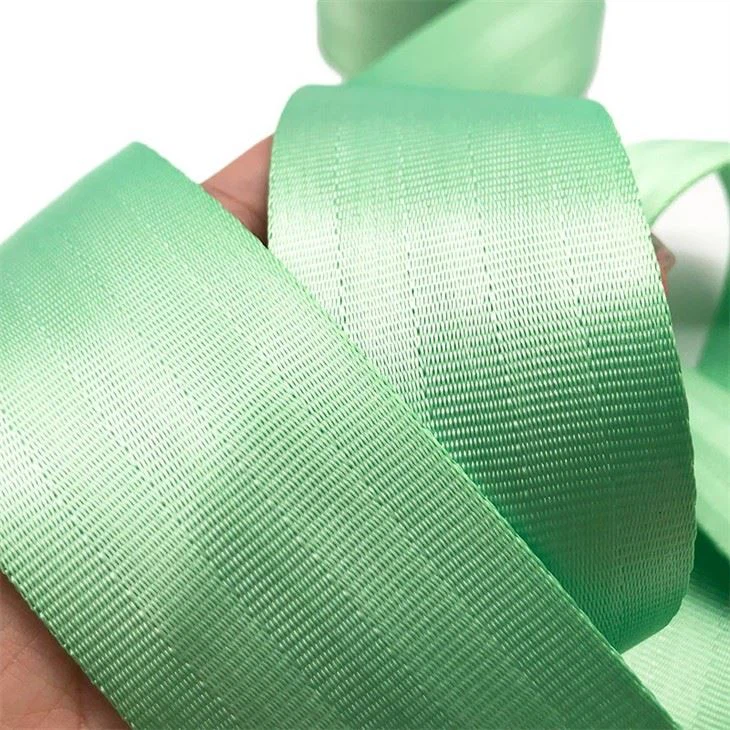 Close-up of green aircraft webbing rolls